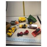 Dump truck, tractors and other toys