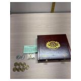 Wood cigar box of coins: Eisenhower Dollar, seven