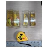 4 new fish lures and tape measure