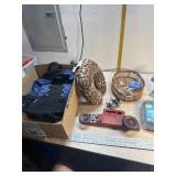 Backpack, neck Pillow, hot glue gun, cross,