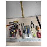 Small pry bar, several screw drivers, gun lock