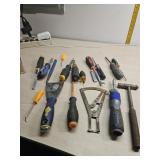 Screw drivers,  hammer and guages