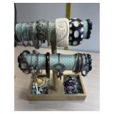 Bracelets, watch and more all on Holder