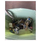 Tote with blue book of Gun Values. Sink  hoses.