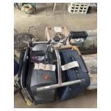 2 suit cases and pedal machine