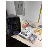 Trash can with paint, grinder wheels, sand paper,