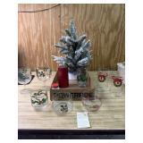 Table top Christmas tree,  glasses and candle