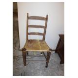 Wooden Chair with Cow Hide Bottom Appears to be