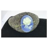 Metal Bracelet with Lady Sculpture on It