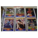 Football and Baseball cards in binder
