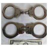 2 Sets of Handcuffs - Fury 15900 & Peerless 801