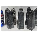 7 Marble Obelisk Towers w Black & Green Hues