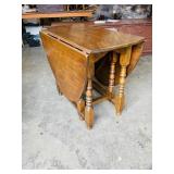 antique oak drop leaf table , oval shape -