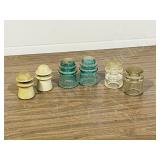 6 glass insulators -