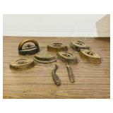 7 Sad Iron bases, 1 handle, 2 stove handles-