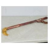 24' long machete in sheath
