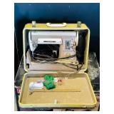 Singer sewing machine in case