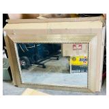 beveled mirror in wood frame
