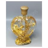 Decorative glass bottle w/ gold leaf in liquid 8'