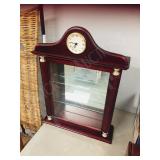 wall curio cabinet w/ clock on top