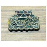 cast Coke Trivet