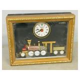 Quartz steam engine made of watch parts-