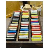 Collection of 54 , 8 track tapes in holder -