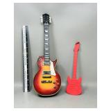 1 guitar bank & 1 guitar spatula