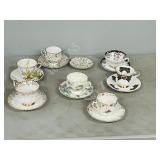 7 assorted china cups & saucers