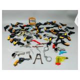 collection of mini toy pistols & misc