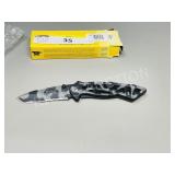 NEW Buck bones tiger stripe folding knife