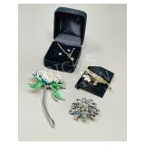 3 brooches & black pearl necklace & earrings