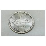 1966 Canadain silver dollar coin