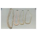 assorted vintage Pearl necklaces