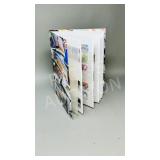small binder of 172 square shape world stamps