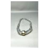 large silver color necklace w/ 1/2' ball pendant