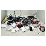 collection of various chargers, cables & cords