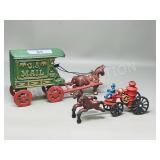 pair of cast metal horse & wagon teams
