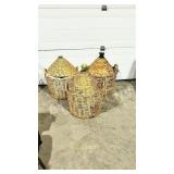 3 large deminjohns in wicker baskets