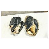 pair of vintage leather ball gloves