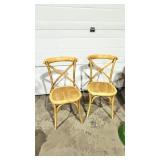 pair of wood cross back side chairs