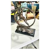 15' tall , Wheel man scultpure - resin - 12' wide