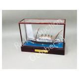 mini Titanic model in 7" long case