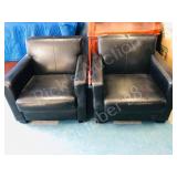 pair of square design leather easy chairs