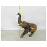 wood elephant with tusks