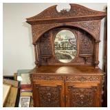 HEAVILY CARVED MIRRORED BUFFET