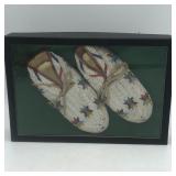 NATIVE AMERICAN MOCCASINS IN DISPLAY