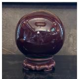 Brown Ceramic Sphere on Wooden Base 8" x 10"