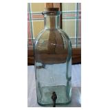 Vintage Decorative Bottle with a Brass Faucet