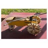 Yellow Metal Tractor Sprinkler
